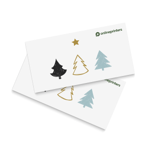 Zwei übereinanderliegende Visitenkarten zeigen jeweils drei stilisierte Weihnachtsbäume in Schwarz, Gold und Blau mit einem goldenen Stern oben drauf. Das „onlineprinters“-Logo ziert die obere rechte Ecke – perfekt für Weihnachtsgrüße geschäftlich.